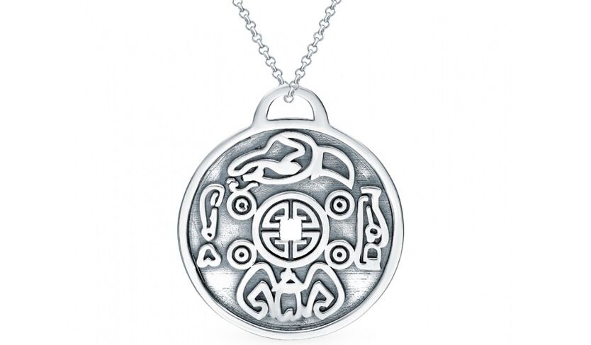 Silver coin as an amulet of luck